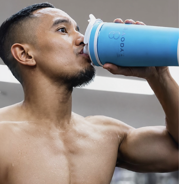 Athlete drinking LIV Pre-Workout