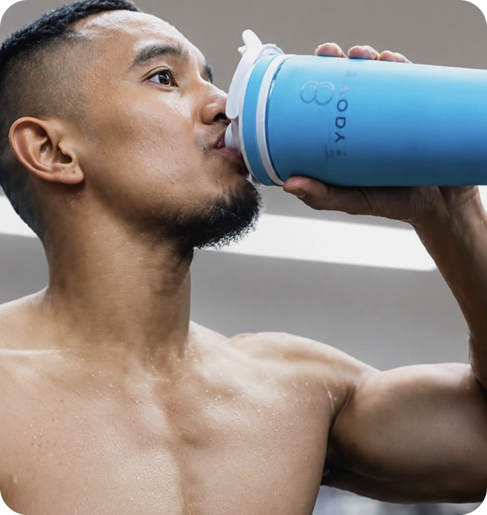 Athlete drinking LIV Pre-Workout